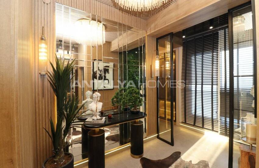 شقق جديدة وأنيقة مطلة على البحر والمدينة للبيع في مرسين تيجي 37