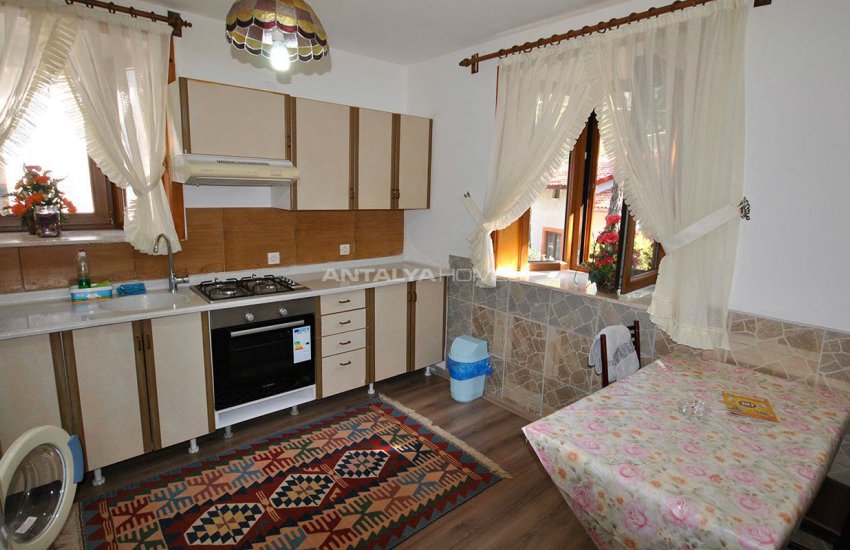 Detached Kemer Houses Intertwined with Nature in Calm Region 6