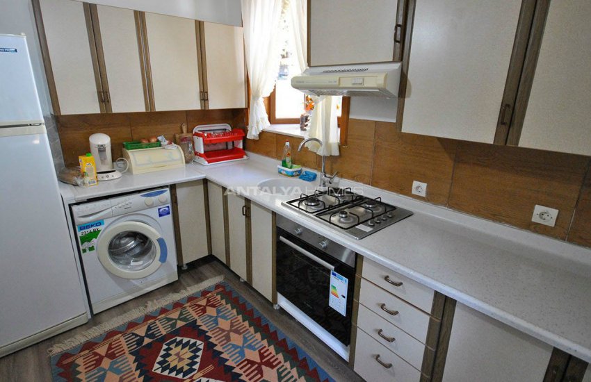 Detached Kemer Houses Intertwined with Nature in Calm Region 7