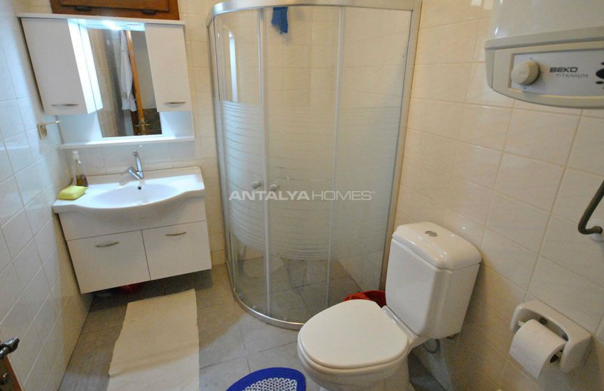 Detached Kemer Houses Intertwined with Nature in Calm Region 10