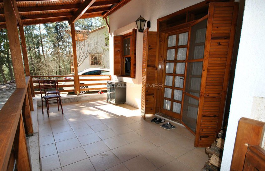 Detached Kemer Houses Intertwined with Nature in Calm Region 12