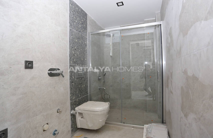 Konyaaltı Hurma'da Havuzlu Binada Yerden Isıtmalı Daireler 28