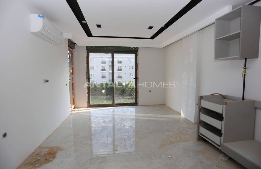 Konyaaltı Hurma'da Havuzlu Binada Yerden Isıtmalı Daireler 24