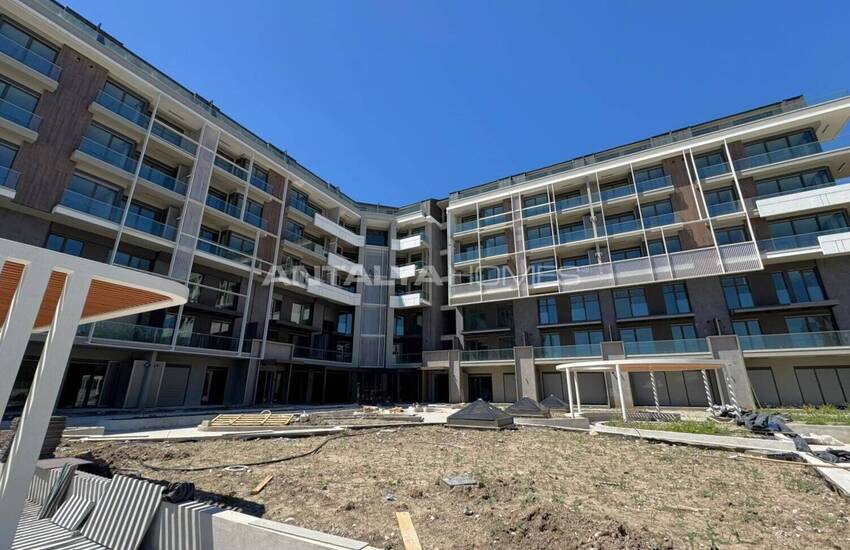 Квартиры в пятизвездочном концептуальном проекте в Коньяалты 23