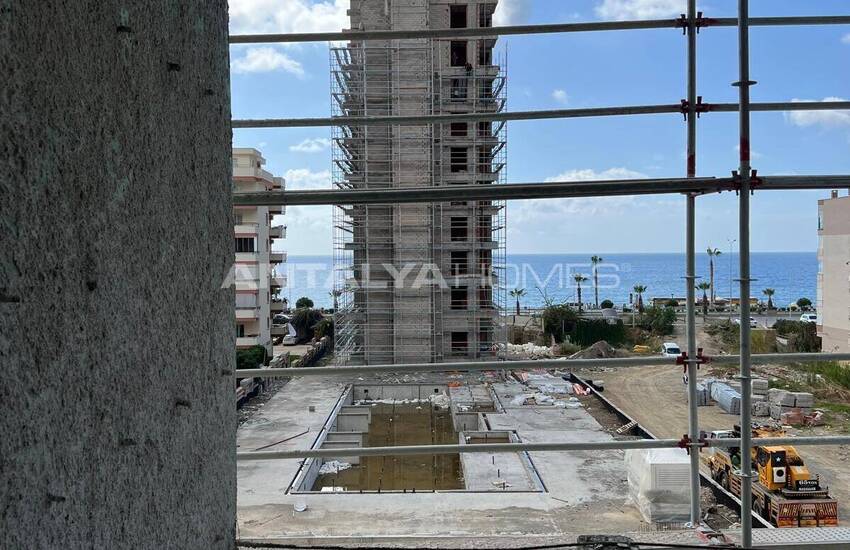 Апартаменты на первой линии пляжа в новом проекте в Алании Турция 22