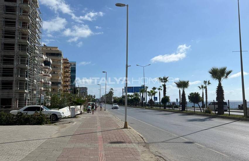 Апартаменты на первой линии пляжа в новом проекте в Алании Турция 23