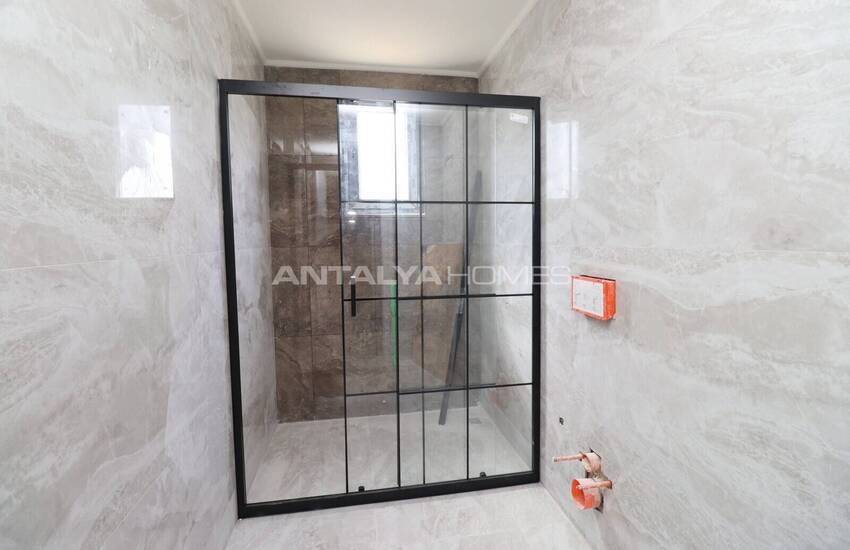 شقق مع مسبح مشترك بالقرب من الشاطئ في كونيالتي، أنطاليا 25