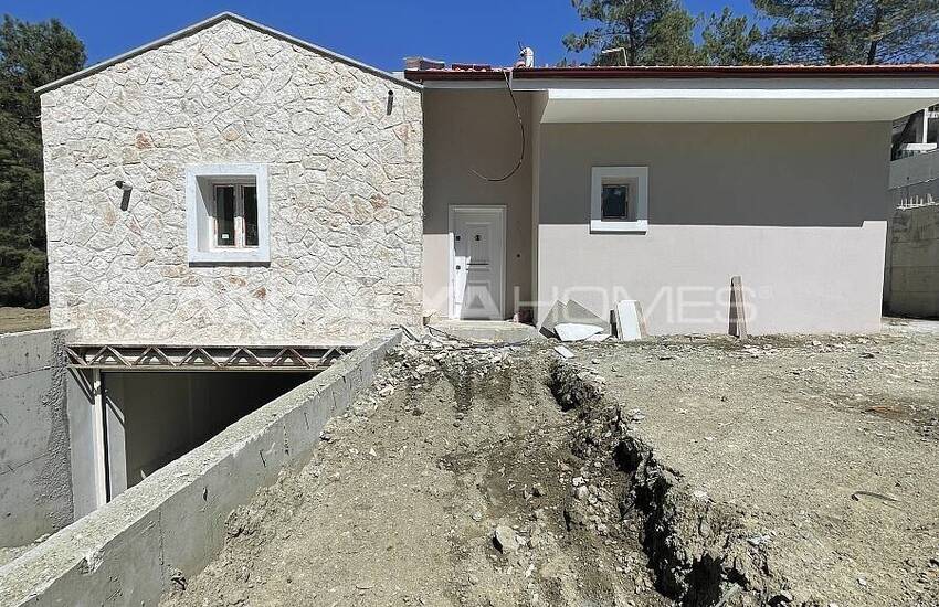 منازل من طابق واحد مع مناظر طبيعية في فتحية أوزوملو 36