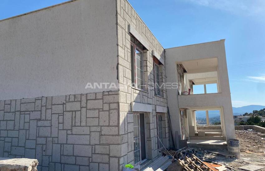 فيلات جديدة حديقة منفصلة وتوأم بالقرب من المطار في بودروم 31