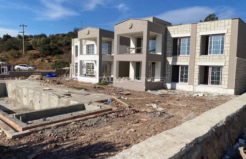 فيلات جديدة حديقة منفصلة وتوأم بالقرب من المطار في بودروم 25