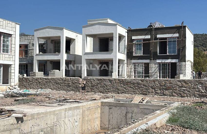 فيلات جديدة حديقة منفصلة وتوأم بالقرب من المطار في بودروم 26