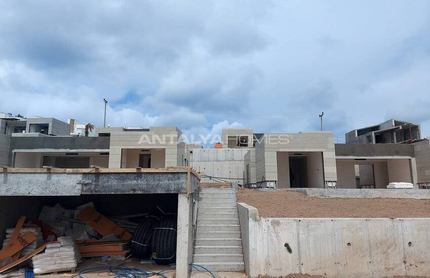 فيلات مطلة على الحمام سباحة والبحر في المدينة بودروم خليج جوندوغان 16