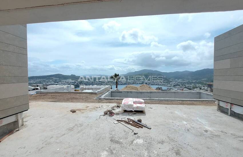 فيلات مطلة على الحمام سباحة والبحر في المدينة بودروم خليج جوندوغان 17