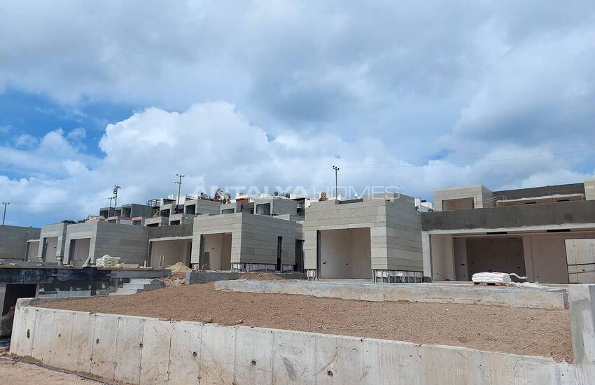 فيلات مطلة على الحمام سباحة والبحر في المدينة بودروم خليج جوندوغان 18