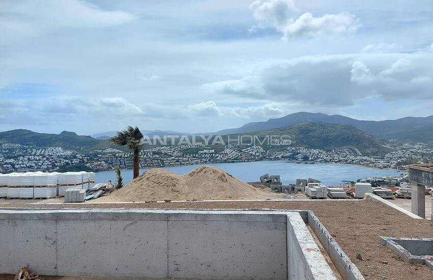 فيلات مطلة على الحمام سباحة والبحر في المدينة بودروم خليج جوندوغان 19