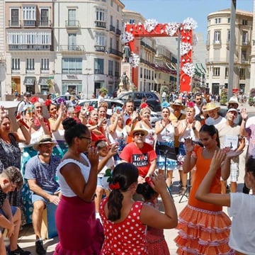 Large crowd cheering and dancing on street of a city Large crowd cheering and dancing on street of a city