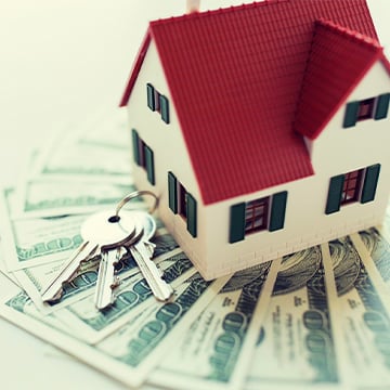 Small House on money with keys Small House on money with keys