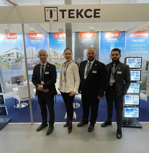 tekce team front of their expo stand