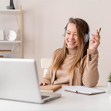 female at work having video call